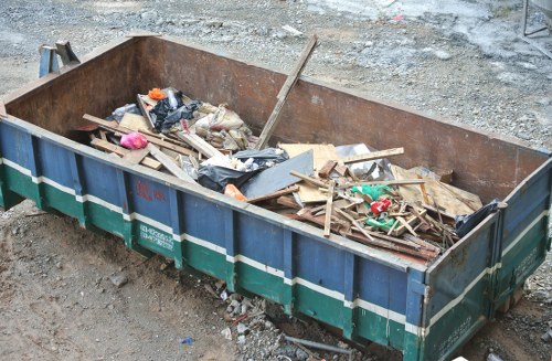 Skip delivery at a Willesden construction site