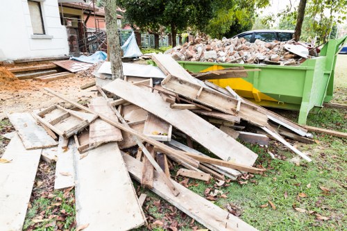 Friendly team assisting with skip hire in Willesden